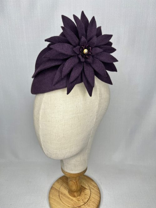 Purple wool felt beret headpiece with large felt flower trim in matching felt fabric.